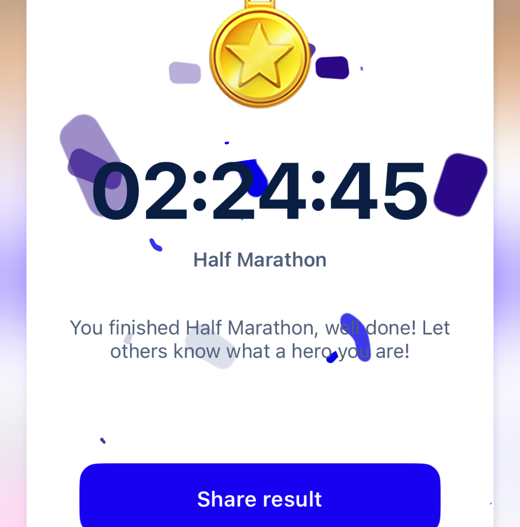 A digital screen shows a Half Marathon completion time of 2 hours, 24 minutes, and 45 seconds, with a gold medal icon and a prompt to share the result. | Support refugees across Europe in Greece, France, the UK and the Balkans